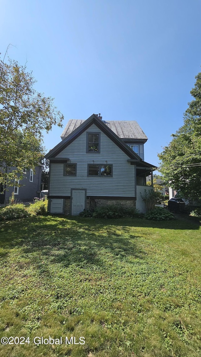 19 George St, Saratoga Springs, Inside, NY 12866 - rear view of house with a yard