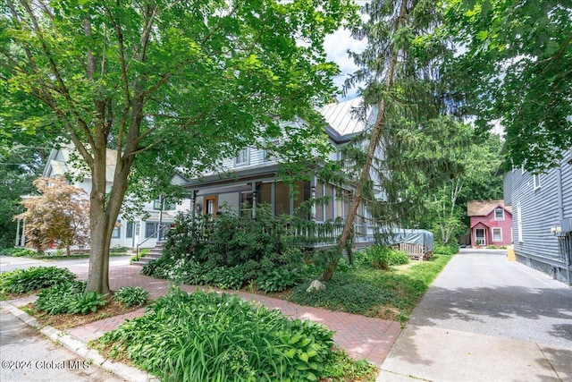 19 George St, Saratoga Springs, Inside, NY 12866 - view of front of house with a standing seam roof and metal roof