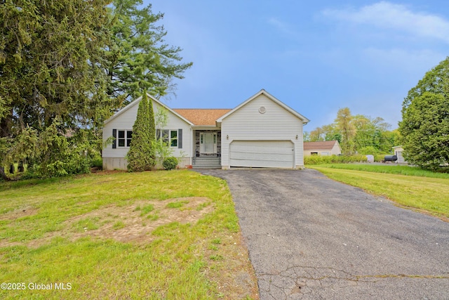 2188 Lynn St, Rotterdam, NY 12306 - view of front of property with an attached garage, asphalt driveway, and a front yard