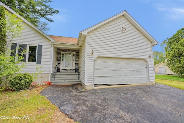 2188 Lynn St, Rotterdam, NY 12306 - ranch-style home featuring an attached garage, asphalt driveway, and roof with shingles