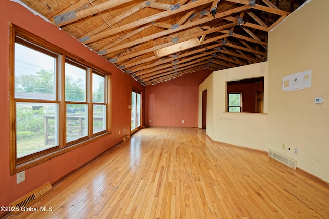 2188 Lynn St, Rotterdam, NY 12306 - unfurnished room with wood-type flooring, high vaulted ceiling, and baseboards