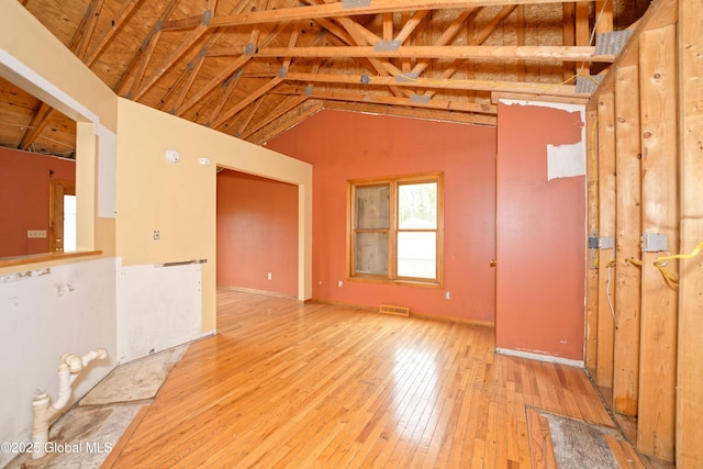 2188 Lynn St, Rotterdam, NY 12306 - spare room featuring hardwood / wood-style flooring and vaulted ceiling