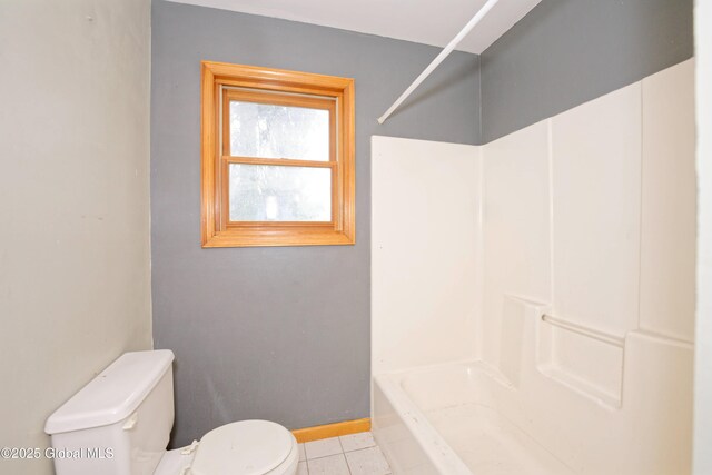 2188 Lynn St, Rotterdam, NY 12306 - full bathroom featuring toilet, tile patterned floors, bathtub / shower combination, and baseboards