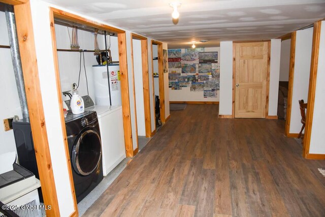 13 Dewey Rd, Chester, NY 12860 - washroom featuring gas water heater, wood finished floors, and baseboards