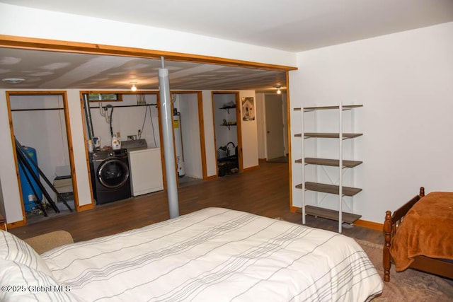 13 Dewey Rd, Chester, NY 12860 - bedroom with wood finished floors, gas water heater, washer and clothes dryer, and baseboards