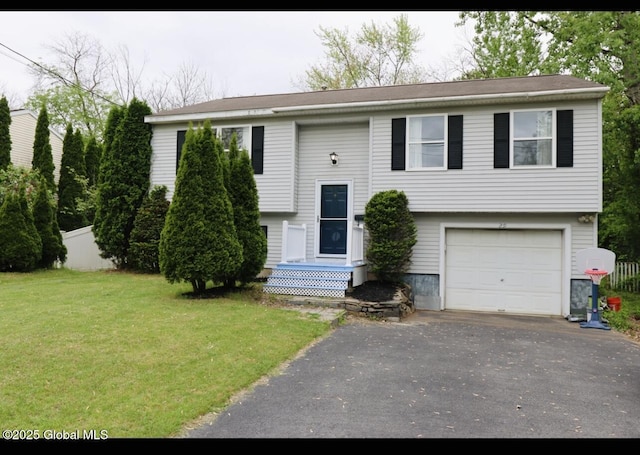 29 Clark St, Hudson Falls, NY 12839 - raised ranch featuring an attached garage and asphalt driveway