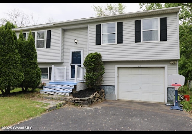29 Clark St, Hudson Falls, NY 12839 - raised ranch featuring a garage