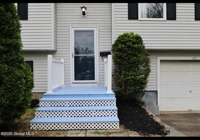 29 Clark St, Hudson Falls, NY 12839 - property entrance featuring an attached garage
