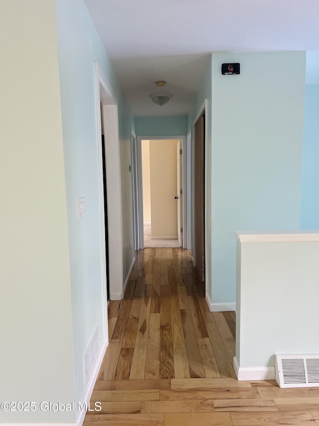 29 Clark St, Hudson Falls, NY 12839 - hallway with hardwood / wood-style flooring and baseboards