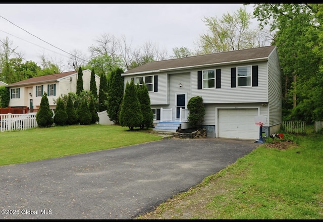 29 Clark St, Hudson Falls, NY 12839 - raised ranch featuring asphalt driveway and a garage