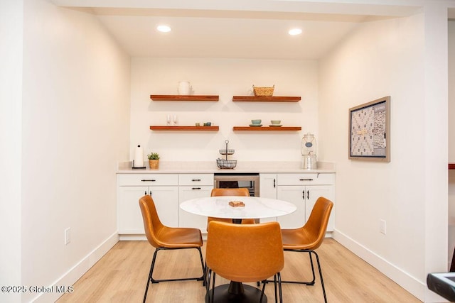 20 Bridgewater Ct, Clifton Park, NY 12065 - dining area featuring light wood-style floors, a dry bar, baseboards, and recessed lighting