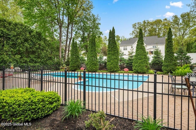 71 Hearthstone Dr, Wilton, NY 12831 - community pool featuring a patio and view of wooded area