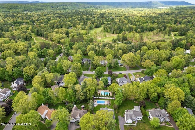 71 Hearthstone Dr, Wilton, NY 12831 - aerial overview of property's location featuring a heavily wooded area and nearby suburban area
