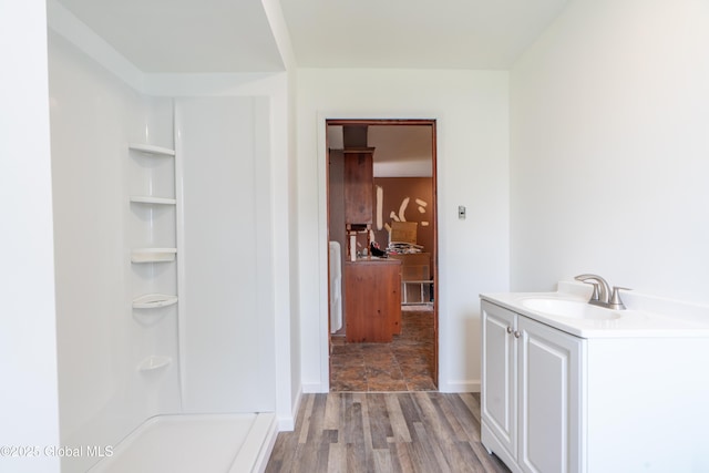 8 Rosewood Ave, Johnstown, NY 12095 - bathroom featuring wood finished floors, a shower, and vanity