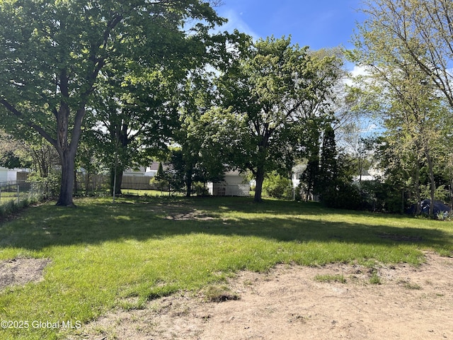 view of yard with fence