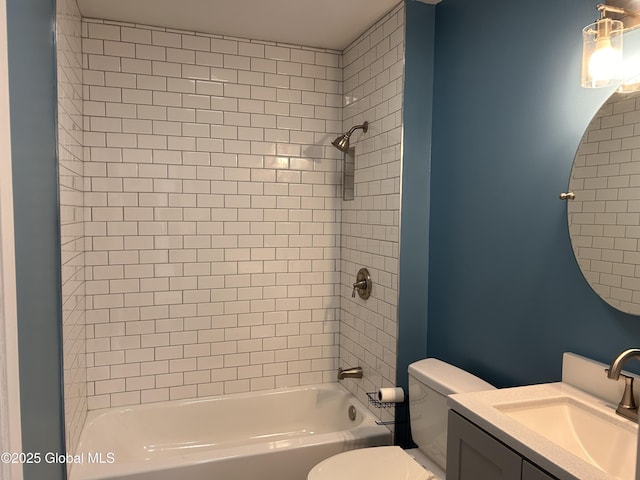 full bath featuring toilet, shower / washtub combination, and vanity