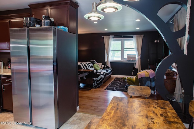 31 Whipple Tree Rd, Milton, NY 12020 - kitchen with freestanding refrigerator, recessed lighting, light countertops, and arched walkways