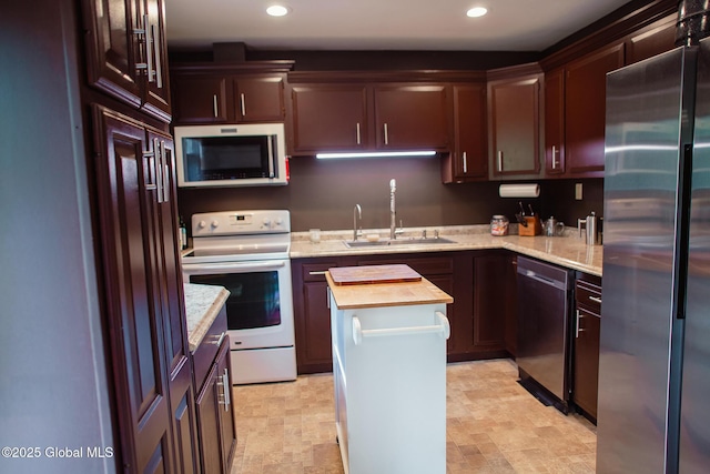 31 Whipple Tree Rd, Milton, NY 12020 - kitchen featuring stainless steel appliances, a sink, recessed lighting, a kitchen island, and stone finish floors