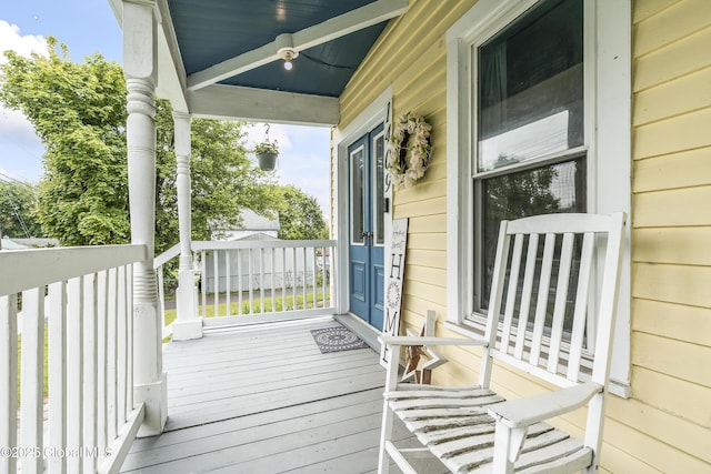 1409 Indian Fields Rd, Bethlehem, NY 12067 - wooden deck featuring covered porch and a ceiling fan