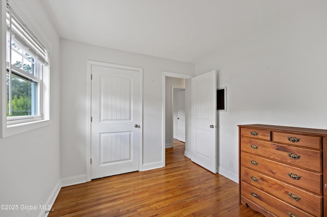7 Hathorn Blvd, Saratoga Springs, NY 12866 - bedroom with light wood-type flooring and baseboards
