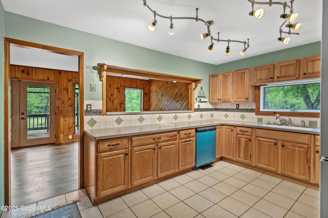 401 Wilton Gansevoort Rd, Wilton, NY 12831 - kitchen with a sink, dishwasher, plenty of natural light, and decorative backsplash