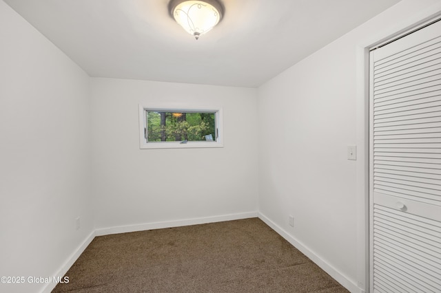 401 Wilton Gansevoort Rd, Wilton, NY 12831 - empty room featuring dark carpet and baseboards
