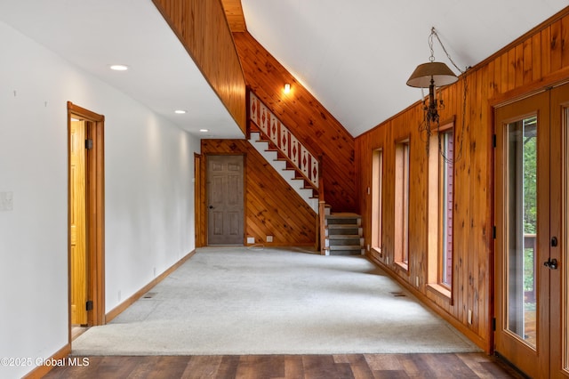 401 Wilton Gansevoort Rd, Wilton, NY 12831 - entryway with wooden walls, stairs, lofted ceiling, wood finished floors, and baseboards
