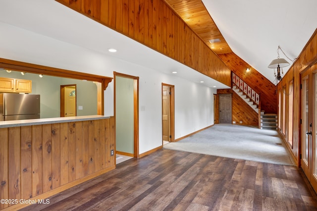 401 Wilton Gansevoort Rd, Wilton, NY 12831 - unfurnished living room with stairway, dark wood-type flooring, wooden walls, baseboards, and recessed lighting