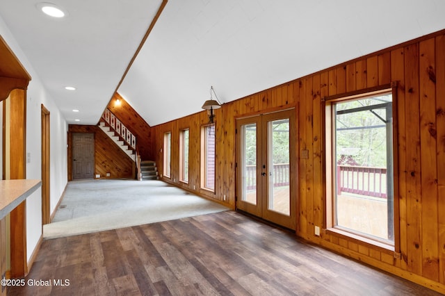 401 Wilton Gansevoort Rd, Wilton, NY 12831 - foyer entrance featuring wood walls, stairway, french doors, vaulted ceiling, and wood finished floors