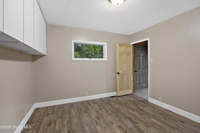 401 Wilton Gansevoort Rd, Wilton, NY 12831 - empty room featuring baseboards and dark wood-type flooring