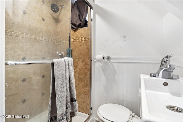 57 O Connell St, Albany, NY 12209 - bathroom with a shower stall, wainscoting, toilet, and a sink