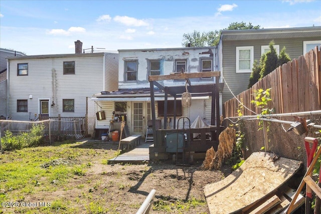 57 O Connell St, Albany, NY 12209 - rear view of house with a deck and a fenced backyard