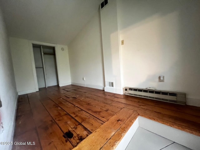 7 Union St, Schenectady, NY 12305 - unfurnished living room featuring a baseboard radiator, wood-type flooring, and vaulted ceiling
