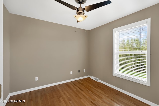13 Peach Tree Ln, Wilton, NY 12831 - unfurnished room with baseboards, wood finished floors, and a ceiling fan