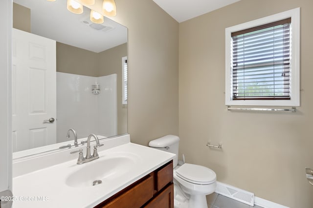 13 Peach Tree Ln, Wilton, NY 12831 - full bathroom with toilet, vanity, baseboards, a shower, and tile patterned floors