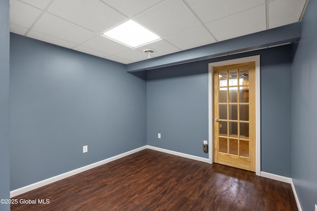 13 Peach Tree Ln, Wilton, NY 12831 - spare room featuring wood finished floors, a drop ceiling, and baseboards