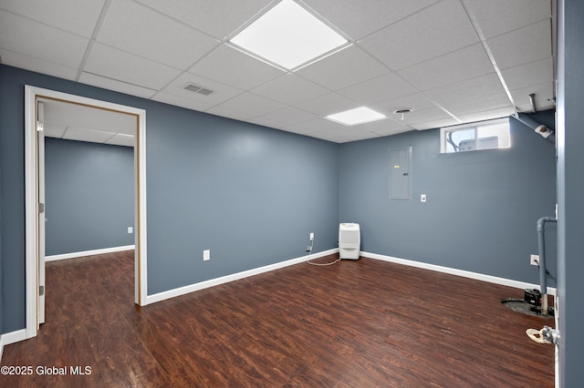 13 Peach Tree Ln, Wilton, NY 12831 - empty room with a drop ceiling, wood finished floors, and baseboards