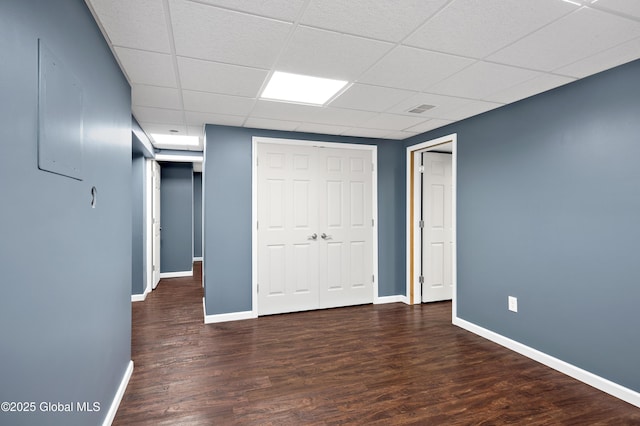 13 Peach Tree Ln, Wilton, NY 12831 - unfurnished bedroom featuring wood finished floors, baseboards, a closet, and a drop ceiling