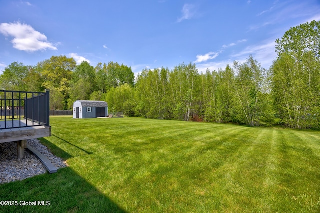 13 Peach Tree Ln, Wilton, NY 12831 - view of grassy yard with a deck and a forest view