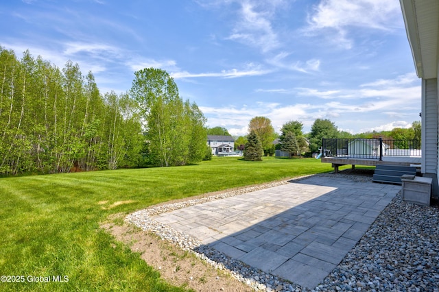 13 Peach Tree Ln, Wilton, NY 12831 - view of green lawn with a patio and a wooden deck