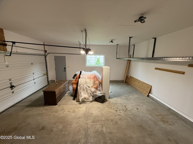 13 Peach Tree Ln, Wilton, NY 12831 - garage featuring a garage door opener