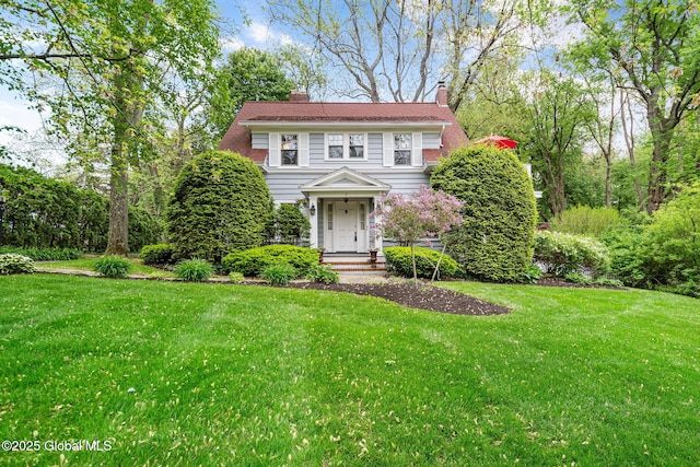2 Loudon Pkwy, Colonie, NY 12211 - colonial inspired home with a chimney and a front yard