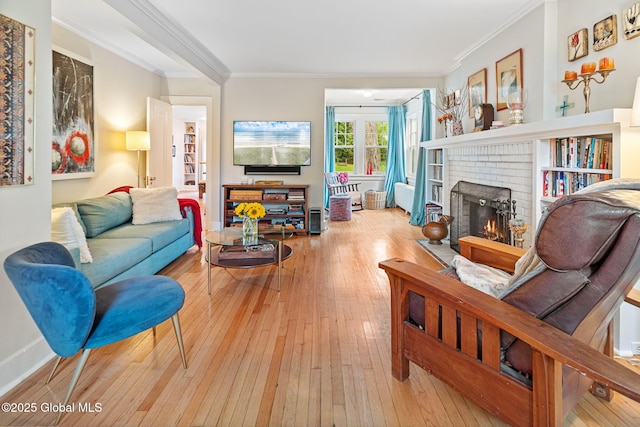 2 Loudon Pkwy, Colonie, NY 12211 - living room featuring hardwood / wood-style floors, ornamental molding, and a brick fireplace