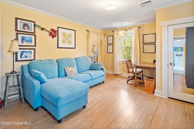 2 Loudon Pkwy, Colonie, NY 12211 - living area with light wood-style floors, ornamental molding, a chandelier, and baseboards