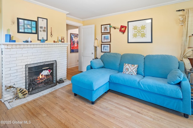 2 Loudon Pkwy, Colonie, NY 12211 - living room with crown molding, wood finished floors, a fireplace, and baseboards