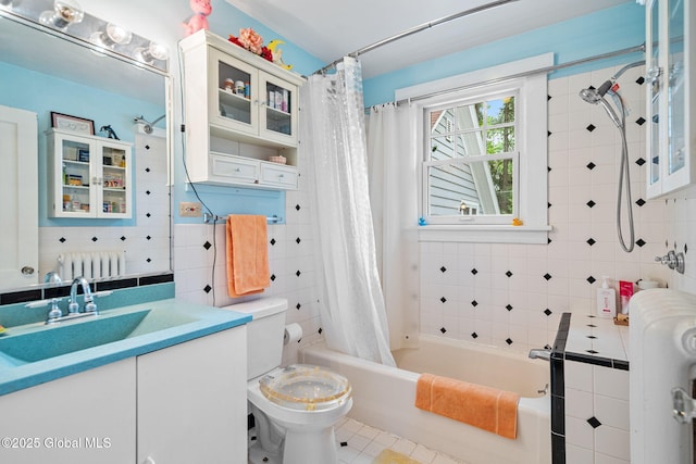 2 Loudon Pkwy, Colonie, NY 12211 - bathroom with shower / tub combo with curtain, vanity, tile walls, toilet, and tile patterned floors