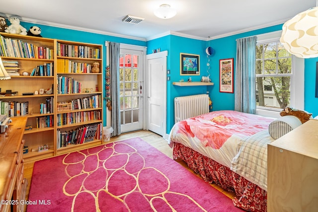 2 Loudon Pkwy, Colonie, NY 12211 - bedroom featuring radiator heating unit, wood finished floors, and crown molding