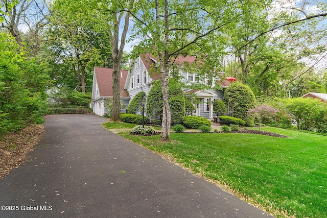2 Loudon Pkwy, Colonie, NY 12211 - view of front facade with driveway, a front lawn, and a garage