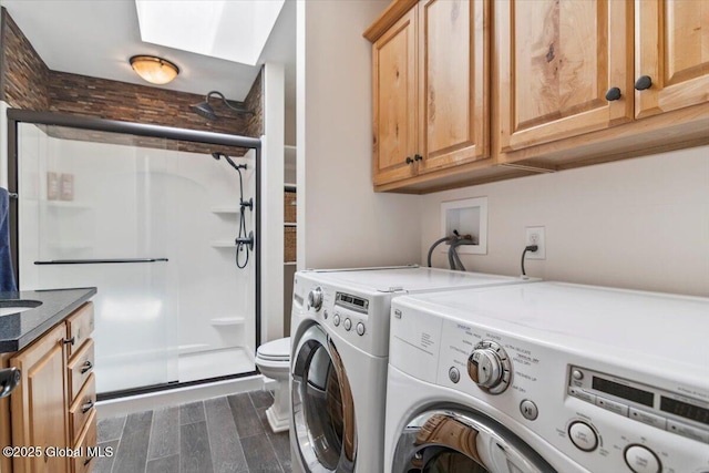 2158 State Route 29, Greenwich, NY 12834 - laundry area with washing machine and clothes dryer and dark wood-type flooring