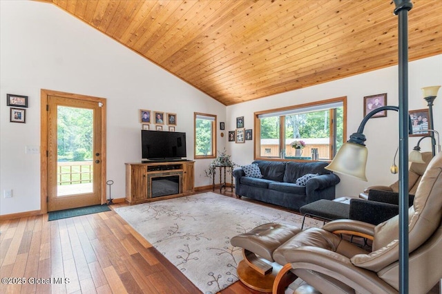 2158 State Route 29, Greenwich, NY 12834 - living room featuring wooden ceiling, hardwood / wood-style flooring, high vaulted ceiling, and baseboards